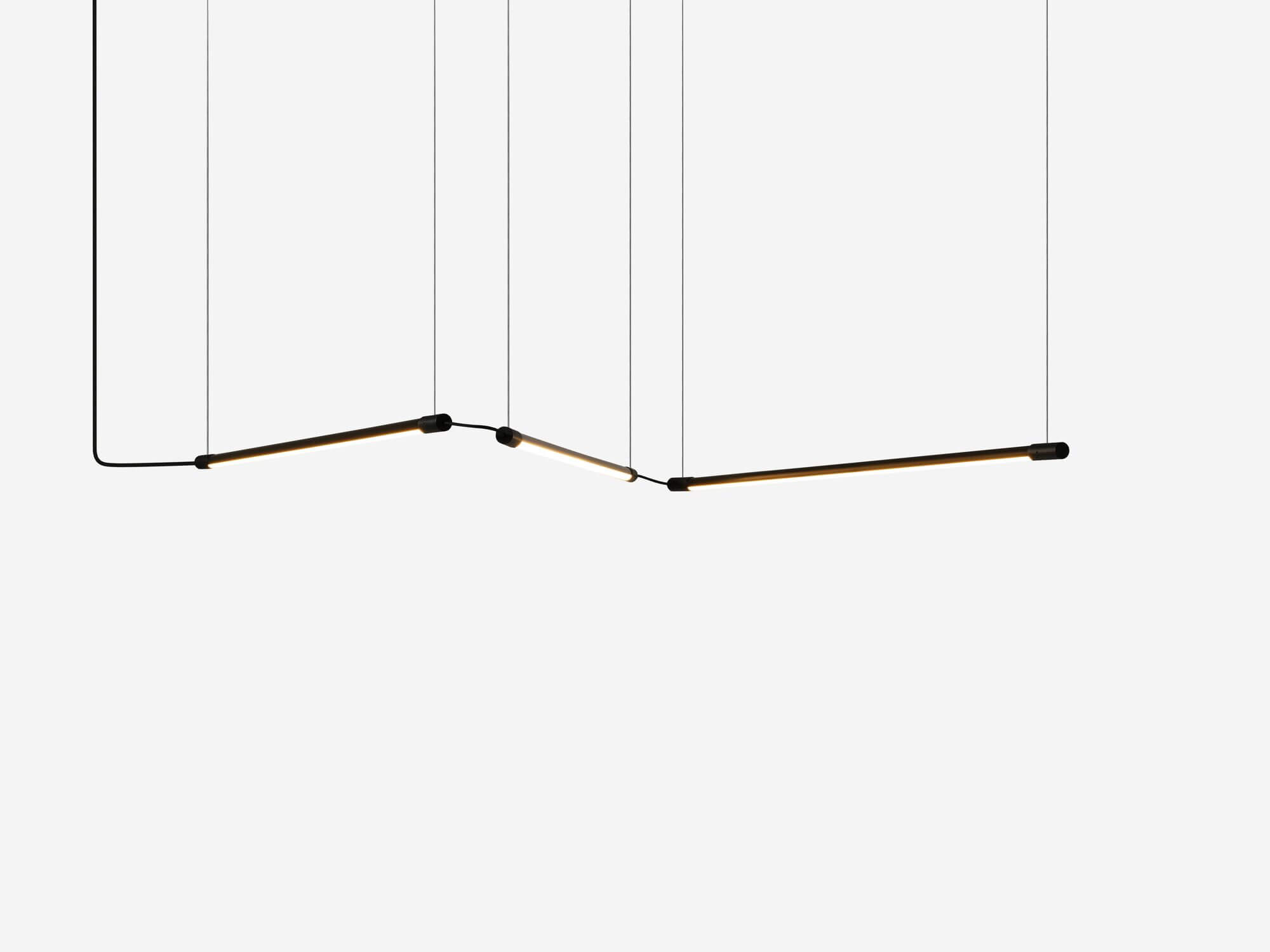 Side view of curving slim black pendant lamp